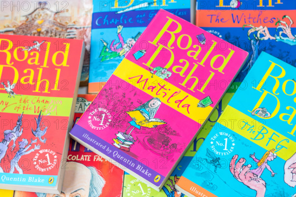 stack pile of childrens books, kids books, children favourites, roald dahl book, matilda bfg chocolate factory witches, kids favourite author classics