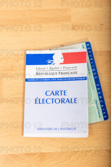 France, Paris, November, 14, 2019, French electoral voter cards official government allowing to vote paper on wooden background, France