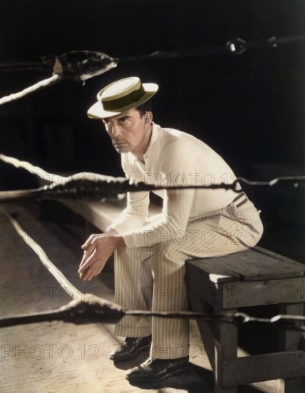 Portrait of Buster Keaton sitting on bench, Photo by George Hurrell / File Reference # 33962-201THA