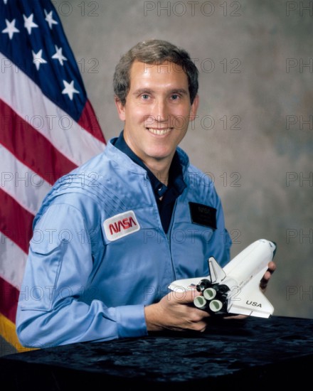 Michael John Smith (April 30, 1945 – January 28, 1986), (Capt, USN), American engineer and astronaut. He served as the pilot of the Space Shuttle Challenger when it was destroyed during the STS-51-L mission, when it broke up 73 seconds into the flight, and at an altitude of 48,000 feet (14.6 km), killing all 7 crew members. Smith's voice was the last one heard on the Challenger voice recorder. He was a Master of Science who held a degree in Aeronautical Engineering.