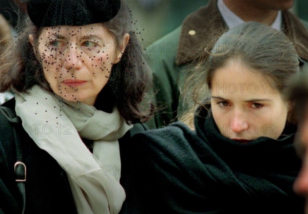 Francois Mitterrand Funeral in his home town of Jarnac in the Charente in south western France 11 January 1996 The mistress of Francois Mitterrand Anne Pingeot wearing black hat and their daughter Mazarine Pingeot with dar hair following the coffin of the former President.