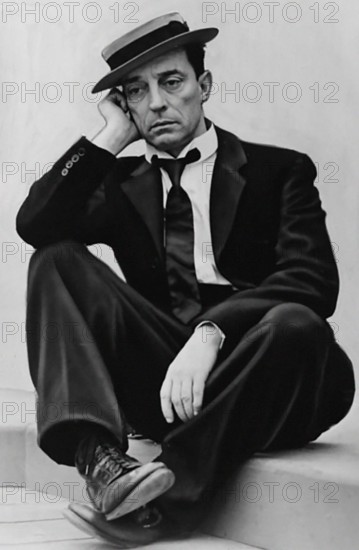 Portrait of the silent film star, Buster Keaton (1895-1966), wearing his trademark pork-pie hat, 1939