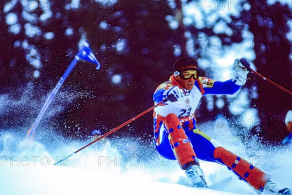 Alberto Tomba (ITA) competing in the men's slalom at the 1988 Olympic  Winter Games