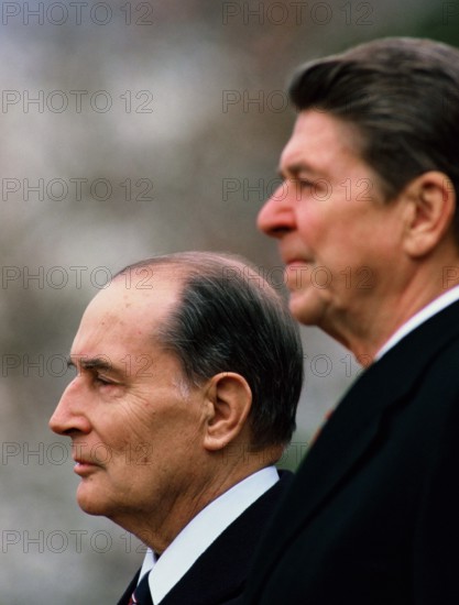 Presiden Reagan and French President  François Mitterrand during an arrival cermony on the South Lawn of the White House in March 1984 Photo by Dennis Brack. bb77