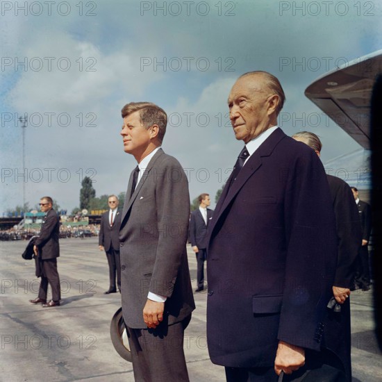 KN-C29230                                                      23 June 1963  Trip to Europe: Germany, Bonn: Arrival, Konrad Adenauer, Chancellor of West Germany pictured, 9:50AM [Blemish along right edge is original to the negative.]  Please credit "Robert Knudsen. White House Photographs. John F. Kennedy Presidential Library and Museum, Boston"