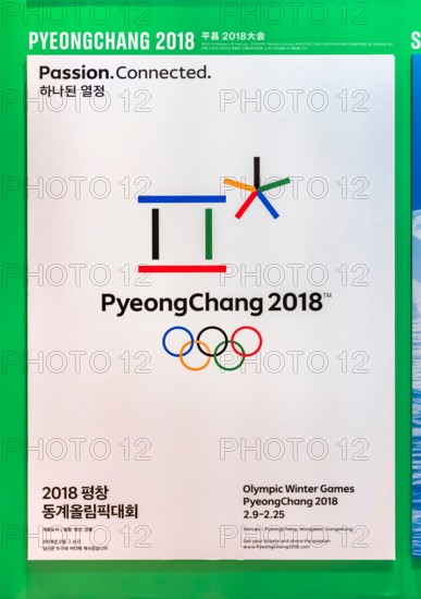 tokyo, japan - august 10 2021: Korean poster of PyeongChang 2018 winter olympics games depicting Korean Hangul word symbolising a gathering place wher