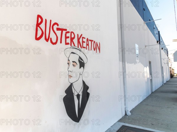 Los Angeles, CA, USA - February 18, 2022: Exterior of the Quixote Film Production Supply with a commemorative mural of Buster Keaton.
