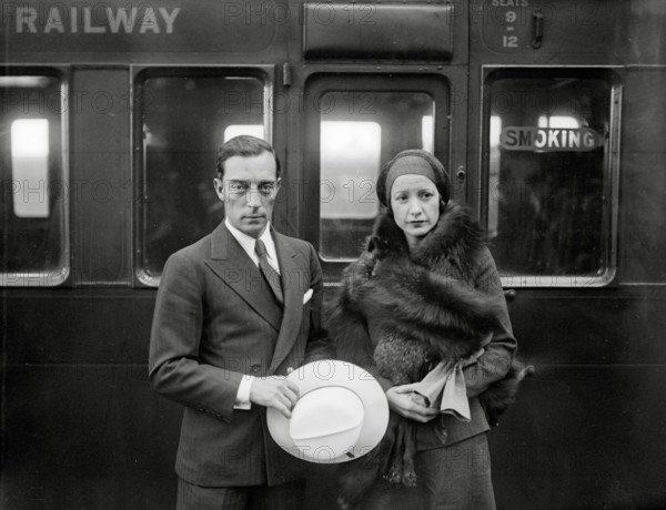 Silent film star Buster Keaton with his wife Natalie Talmadge, sister of film stars Constance and Norma Talmadge, circa 1930. File Reference # 34145-684THA