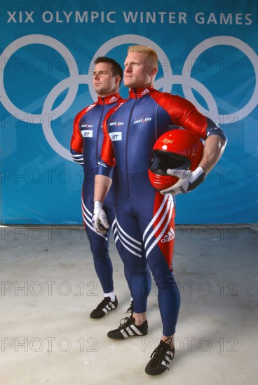 National Guard SPECIALIST (E-4) Mike Kohn, USA, (left) and Army SPECIALIST (E-4) Doug Sharp will take to the track at the Utah Olympic Park to represent the United States in the men's four-man bobsled event during the 2002 OLYMPIC WINTER GAMES held in Salt Lake City. Subject Operation/Series: 2002 OLYMPIC WINTER GAMES Base: Salt Lake City State: Utah (UT) Country: United States Of America (USA)
