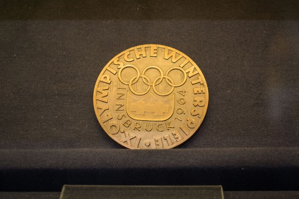 Tartu, Estonia - June 10, 2023: Participation medal design from Olympics in Innsbruck 1964.