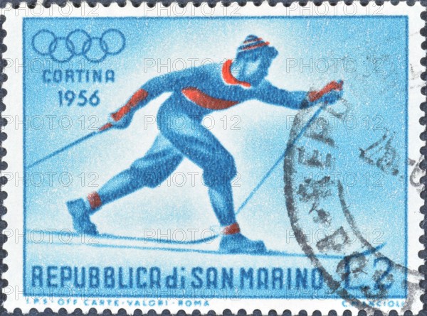 Cancelled postage stamp printed by San Marino, that shows Cross-Country Skiing, Winter Olympic Games 1956 - Cortina d'Ampezzo, circa 1955.