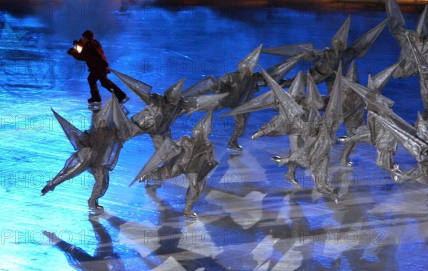 OT.135211.- - DELIVER TO:.sports.- -.2/8/2002.- -.Salt Lake City.- -.Opening Ceremonies of the XIX Winter Olympic Games at Rice-Eccles Stadium in Salt Lake City The Child of Light skates during opening sequence called Fire Within.- -.Times Photo by:.James Borchuck.- -.Story By:.romano.- -.SCANNED BY:.. RUN DATE: .2/9/2002 (Credit Image: St Petersburg Times/ZUMAPRESS.com)