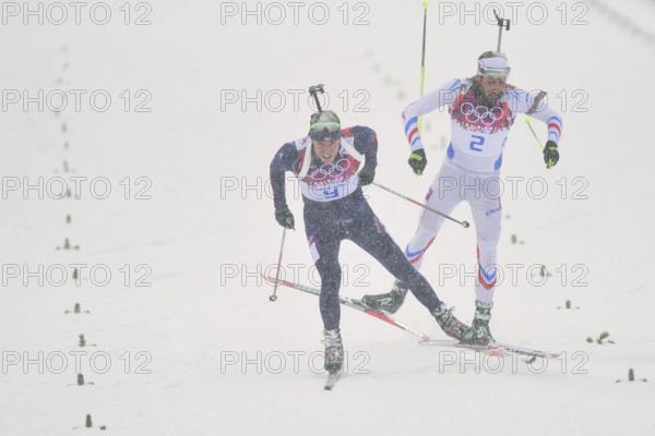 Feb. 18, 2014 - Sochi, Russia - Emil Hegle Svendsen (NOR), left, finishes first for a gold medal ahead of Martin Fourcade (FRA) in the Men's 15km Mass Start Biathlon at the 2014 Winter Olympics in Sochi. (Credit Image: © Troy Wayrynen/ZUMAPRESS.com)