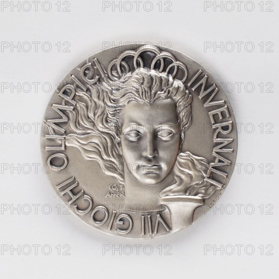 Jul 21, 2016 - Boston, Massachusetts, U.S. - Cortina 1956 Winter Olympics Silver Winner's Medal, sold for $9,432. The 1956 Winter Olympics, officially known as the VII Olympic Winter Games was a winter multi-sport event celebrated in Cortina d'Ampezzo, Italy. This celebration of the Games was held from 26 January to 5 February 1956. (Credit Image: © RR Auction/ZUMA Wire/ZUMAPRESS.com)