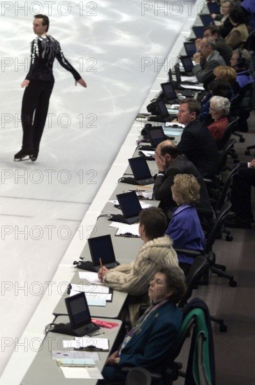 Feb. 14, 2002 - U.S. - KRT SPORTS STORY SLUGGED: OLY-FIGURE KRT PHOTOGRAPH BY DAVID P. GILKEY/DETROIT FREE PRESS (February 14) SALT LAKE CITY, UT--   An international panel of judges looks on at the skaters as they warm up for the men's free skate program at the 2002 Olympic Games at the Salt Lake Ice Center in Salt Lake City, Utah Thursday February 14, 2002. (DE) NC KD BL 2002 (Horiz) (lde) (Credit Image: © Detroit Free Press via ZUMA Press Wire)