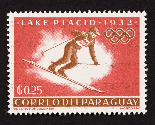 Postage stamp from Paraguay depicting a downhill skier in the 1932 Winter Olympics in Lake Placid, New York.