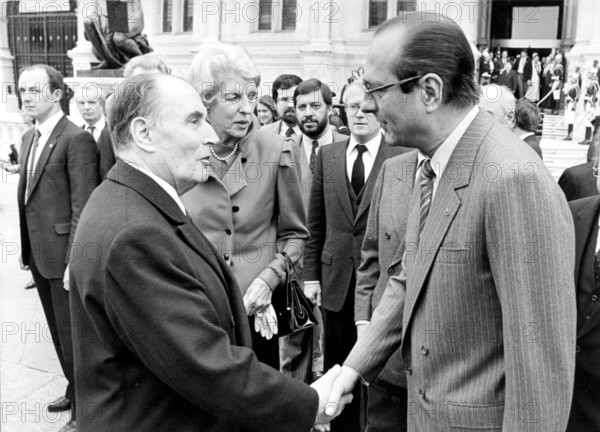 Mayor of Paris JACQUES CHIRAC (right) shaking hands with French president FRANCOIS MITTERRAND