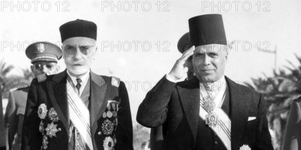 Tunisia achieves Independence in 1956. The Bey of Tunis with Tunisia's first Prime Minister Habib Bourguiba. Muhammad VIII al-Amin was the last Bey of Tunisia until he was deposed in 1957