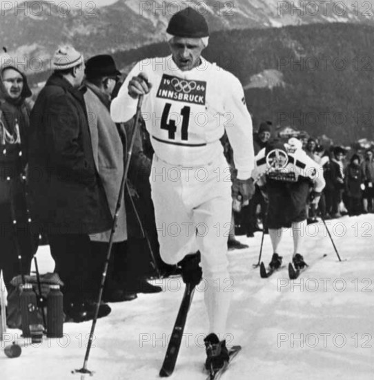 Sixten Jernberg, a Swedish cross-country skier, is shown during the 1964 Winter Olympics in Innsbruck, where he earned a notable place in Nordic skiing history with his exceptional performance.