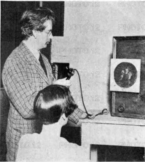 John Logie Baird, a Scottish inventor, demonstrated the first working television system, the 'Televisor', in 1926. This electromechanical device used a spinning Nipkow disk to scan images, converting them into electronic signals displayed on a screen. Baird's innovation laid the foundation for modern television broadcasting.