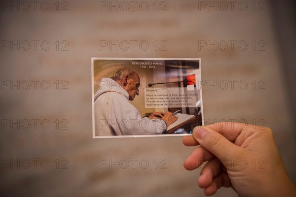 A picture of Father Jacques Hamel - Saint Bartholomew's church, Rome, Italy.