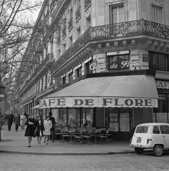 Pariser Bilder [The street life of Paris] Description: Café de Flore in Saint-Germain-des-Prés Annotation: District in the sixth and seventh arrondissement of Paris, traditionally populated by artists, students and intellectuals Date: 1965 Location: France, Paris Keywords: cafes, street images, terraces Institution name: Saint-Germain des Prés
