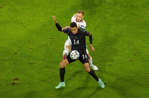 Jamal Musiala (Deutschland), Gergo Lovrencsics (Ungarn)  Deutschland - Ungarn München, 23.06.2021, Fussball, Saison 2020/21  Foto: Moritz Müller  Copy
