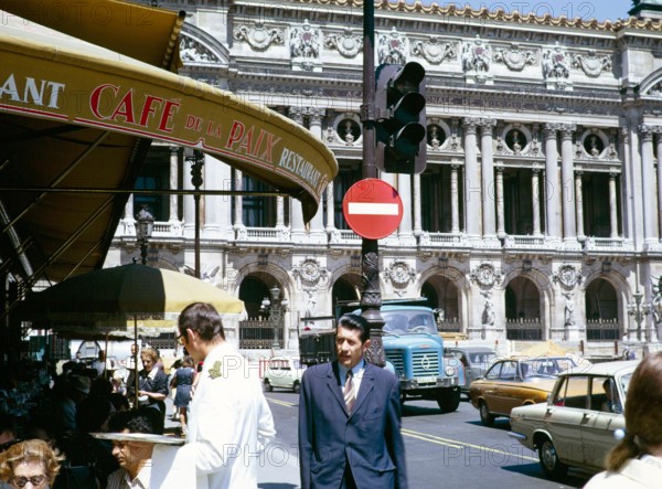 People on street at Cafe de la Paix, Académie nationale de Musique, Paris, France 1971