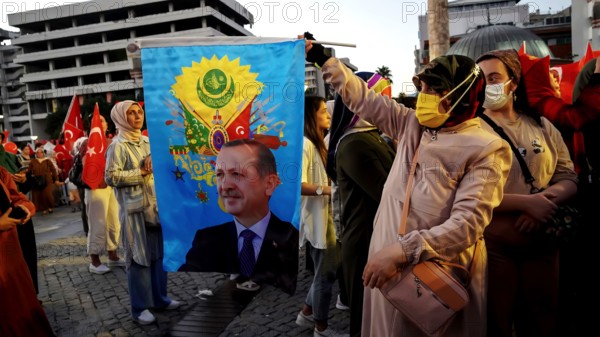 July 15, 2022, Izmir, Turkey, Turkey: People with Turkish flags , some of them with President Erdogan and Ottoman flag attended July 15 Democracy and National Unity Day's events to mark July 15 defeated coup's anniversary at Konak Square. 249 people were martyred and nearly 2,200 people injured in the defeated 15th of July 2016 coup attempt. (Credit Image: © Dil Toffolo/Pacific Press via ZUMA Press Wire)