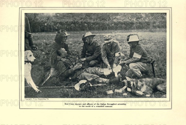 Red Cross Doctors, Medics and Officers of the Italian Bersaglieri attending to the needs of a Wounded Comrade from the book The story of the great war; the complete historical records of events to date DIPLOMATIC AND STATE PAPERS by Reynolds, Francis Joseph, 1867-1937; Churchill, Allen Leon; Miller, Francis Trevelyan, 1877-1959; Wood, Leonard, 1860-1927; Knight, Austin Melvin, 1854-1927; Palmer, Frederick, 1873-1958; Simonds, Frank Herbert, 1878-; Ruhl, Arthur Brown, 1876-  Published 1920