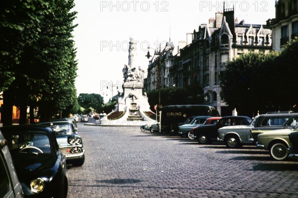 Place Drouet-d'Erlon monument cars parked street, Riems, France, Europe 1960