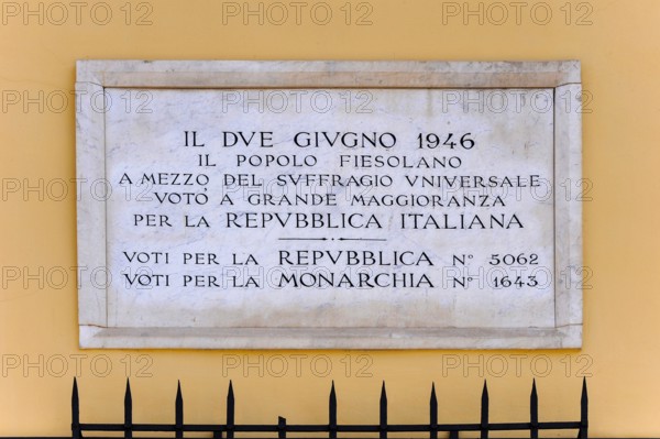 Marble plaque in Fiesole, a town above Florence, Tuscany, Italy, recording the local result of a referendum, held on 2 June 1946, on whether Italy should reinstate the monarchy or become a republic.  The result at Fiesole was emphatically in favour of a republic:  5,062 for and 1,643 against.