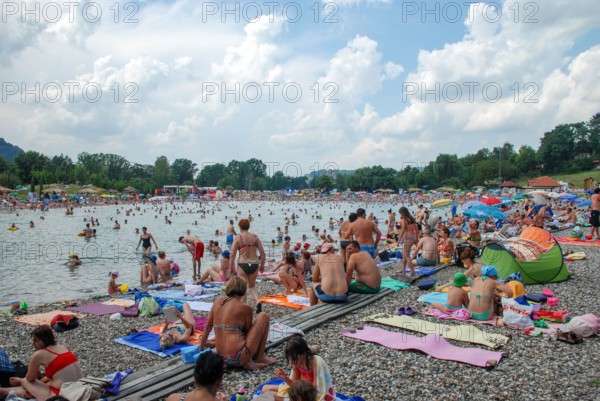 Tuzla, Bosnia and Herzegovina: Pannonian Lakes Complex. Overcrowded open swimming pools during peak of tourist season. Panonska jezera.