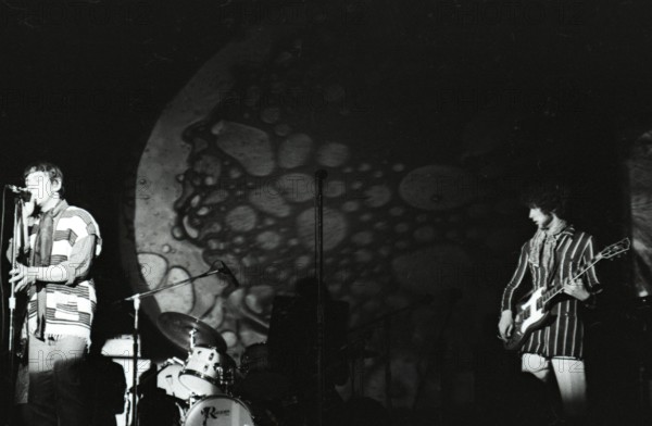 June 17, 1967, Monterey, California, USA - ERIC BURDON, left, of the Animals performs during the Monterey International Pop Music Festival. The festival was a three-day concert event held June 16 to June 18, 1967 at the Monterey County Fairgrounds. Jill Gibson was an experienced photojournalist by 1967 and the Official Photographer for The Monterey Pop Festival. These are her images, many of which have never been released prior to now, in commemoration of the 50th Anniversary of Monterey Pop.