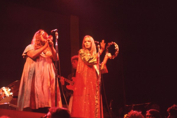 June 17, 1967, Monterey, California, USA - The 'Mamas & the Papas' closed the festival. MICHELLE PHILLIPS, right, and CASS ELLIOT perform on stage during their closing act. The Monterey International Pop Music Festival was a three-day concert event held June 16 to June 18, 1967 at the Monterey County Fairgrounds. Jill Gibson was an experienced photojournalist by 1967 and the Official Photographer for The Monterey Pop Festival. These are her images, many of which have never been released prior to now, in commemoration of the 50th Anniversary of Monterey Pop. (Credit Image: © Jill Gibson/ZUMA Pr