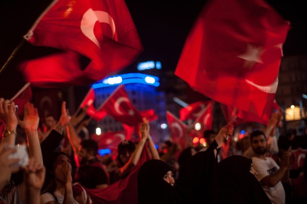 Istanbul, Turkey. July 19th 2016 Turkish pro government supporters in Taksim square waving flags celebrating a failed attempted coup on July 15th
