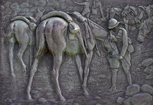 Relief depicting 1915 WW1 soldiers at Syria on a war memorial in Gloucester Gloucestershire England
