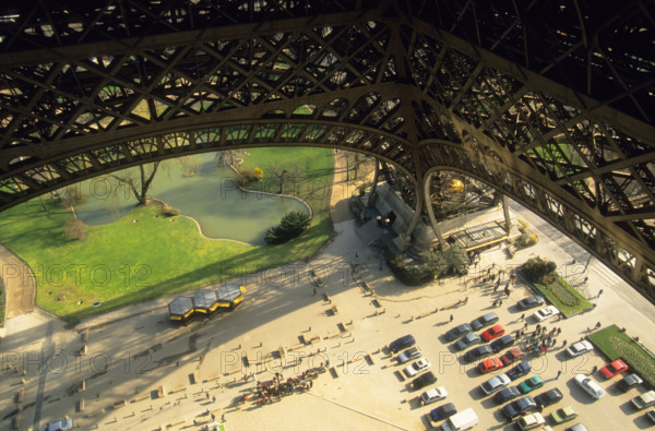 Eiffel Tower structure Paris, France. High view of parking lot or car park, from the elevator. Looking down to the ground. Overhead view.