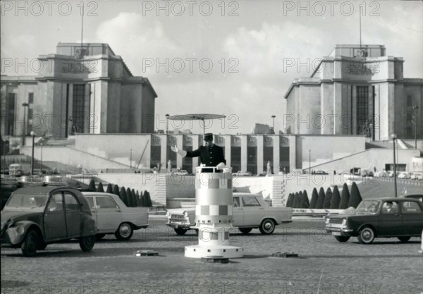 Feb. 06, 1964 - Traffic Officer Directs from Podium, Varsovie Square, Paris