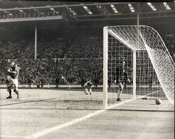 Jul. 30, 1966 - World Cup Football ? England win the World Cup. Geoff. Hurst scores England?s fourth goal. Photo Shows: England?s Geoffrey Hurst (right) is embraced by teammate Alan Ball after he had scored England?s fourth goal in the World Cup Final against West Germany at Wembley today. Hurst scored a hat-trick for England.