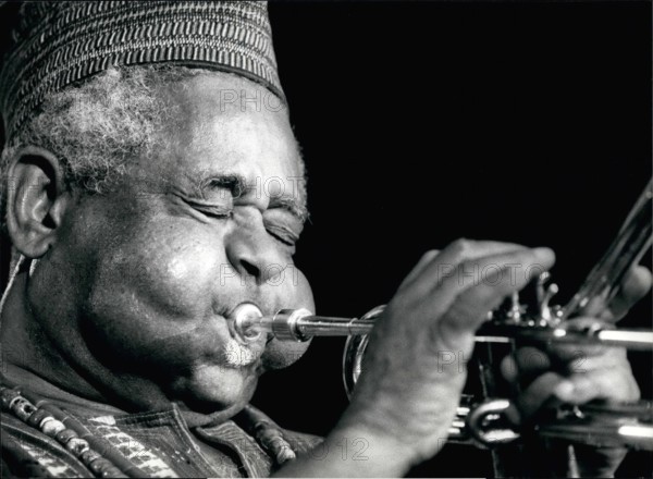 Jul. 07, 1990 - Jazz Festival of Montreux: His eyes shut and cheeks puffed out Dizzie Gillespie is all concentrated effort during the performance of his United Nation Orchestra at the Montreux Jazz Festival, July 16.