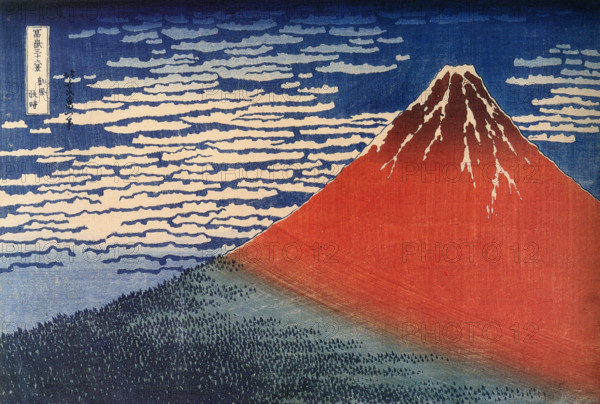 Katsushika Hokusai’s famous woodblock print 'Red Fuji' portrays Mount Fuji against a vibrant red sky. This iconic piece from Hokusai’s 'Thirty-Six Views of Mount Fuji' series captures the grandeur of the mountain with a bold and striking color contrast, exemplifying Hokusai’s masterful printmaking.