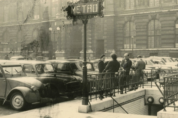 Waiting outside the metro station, Paris, France 1950s