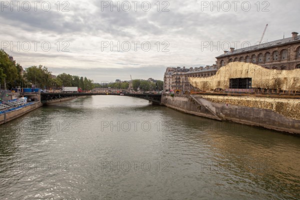 Preparation of the opening ceremony of the Paris 2024 Olympic Games in front of the Hotel Dieu hospital where there will be a dance show on a body of