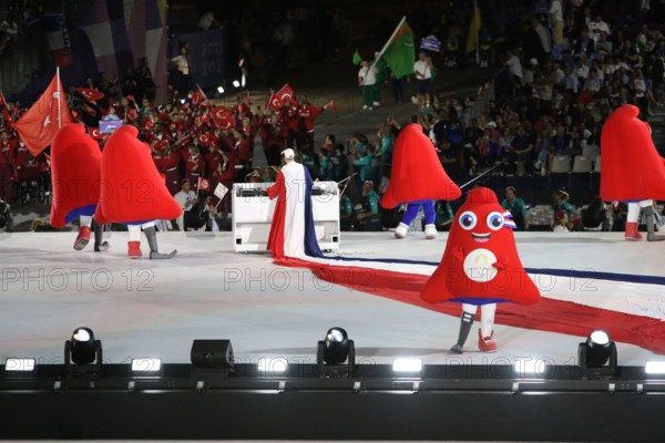 Quentin Lepoutre, better known as DJ Myd performing, along with The Phryges (official mascots) at the opening ceremony of the 2024 Paralympic games on the 28th August 2024 in the Place De La Concorde, Paris, France.