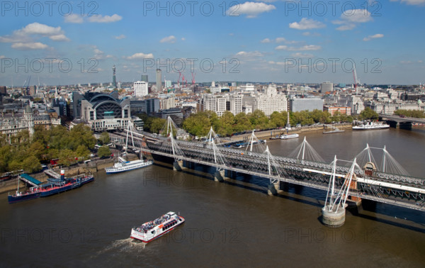 Golden Jubilee (Hungerford Bridge), the city and River Thames, London, England