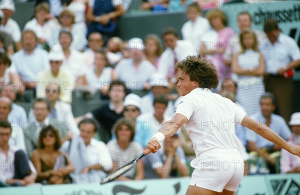 French tennis player Henri Leconte, attending the men's singles round of 16 match of the French Open against fellow French player Yannick Noah.
Paris, Roland-Garros stadium, June 1985