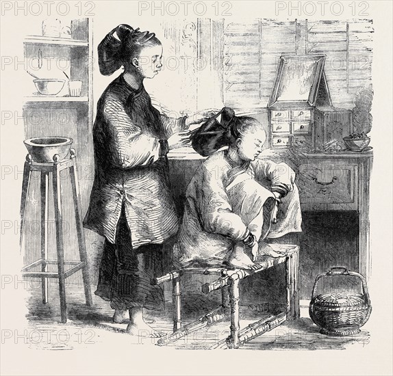 FIXING HAIR A LA TEAPOT, CHINA