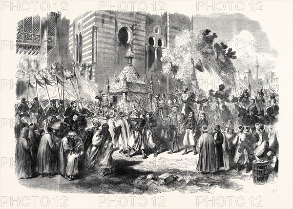 THE PRINCE AND PRINCESS OF WALES IN EGYPT: PROCESSION OF THE HOLY CARPET AT CAIRO, 1869