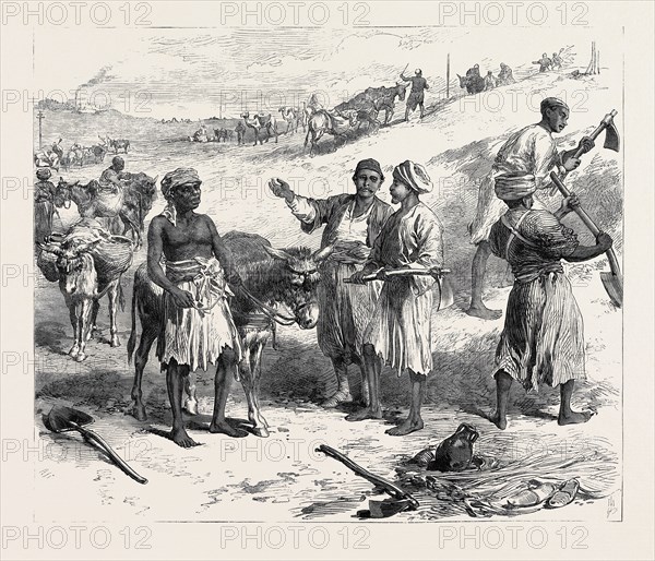 THE ISTHMUS OF SUEZ MARITIME CANAL: LABOURERS REMOVING EARTH, 1869